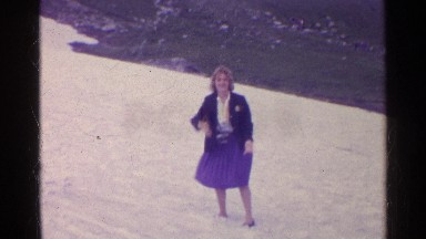 1961: the beautiful women enjoy to throwing the white snow SWITZERLAND