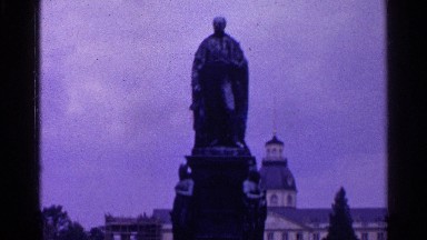 1961: some women are sightseeing in a beautiful area surrounded by buildings