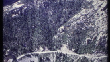 1971: A Ghat Road Runs Along the Chest of a Large Mountain California