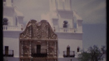 1971: a building that looks like a temple or house but located alone