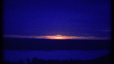 1979: a cute scene of sun rising from the earth to sky at the early morning