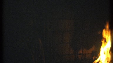 1979: fire is burning near the people where it is for warming ITHACA NEW YORK