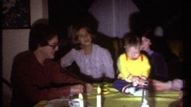1979: baby with family members enjoying ITHACA NEW YORK
