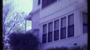 1984: angular house has screened patio and open porch with columns VERMONT
