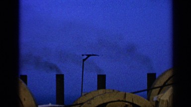 1970: smoke are going through chimney in the industry UNITED KINGDOM