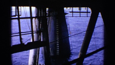 1970: view of the sea with blue water from the deck of a vessel UNITED KINGDOM