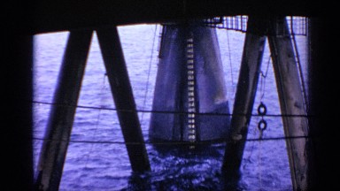 1970: large poles and pillars standing in the waters of the sea UNITED KINGDOM