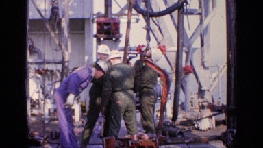 1970: workers are working for a construction and it may be building