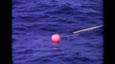 1970: going fishing in the ocean, with a fishing stick, the fishing line