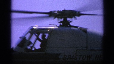 1970: helicopter pilot prepares for take off. UNITED KINGDOM