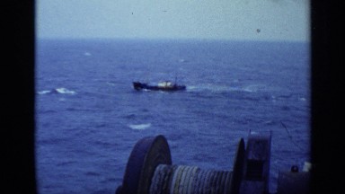1970: someone travelling on the ocean nearer to the another boat UNITED KINGDOM
