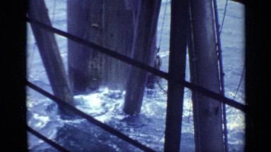 1970: waves washing through the pier UNITED KINGDOM
