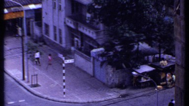 1969: People Walking Along Platform Near Roadside in Thailand