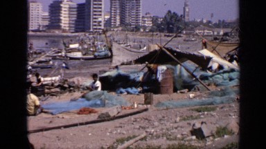 1970: poor native fishermen live in shanties next to their fishing boats