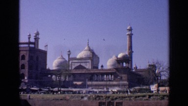 1970: across the street view of a mosque on a gorgeous day a little traffic