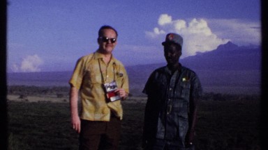 1969: two men standing outside KENYA