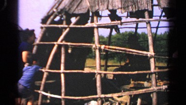 1969: A Man in a Hut, Three People Watching Outside Massachusetts