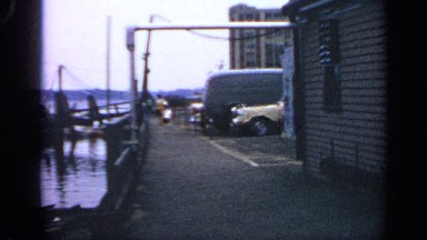 1969: man running in the seashore MASSACHUSETTS