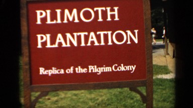 1969: a board that represent the plantation and focused on a wall at the morning