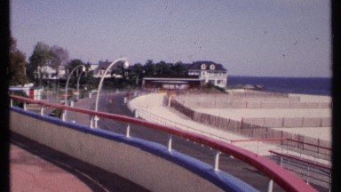 1969: panning view of a beautiful beach with a ramp and fences. NEW LONDON
