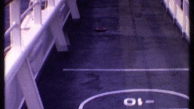 1969: a woman on what appears to be the deck of a ship playing a game