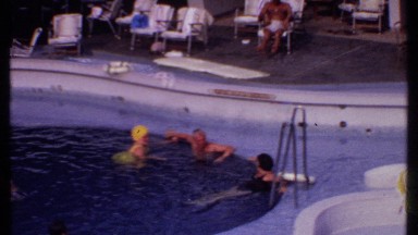 1969: the people are relaxing on the beautiful swimming pool BAHAMAS