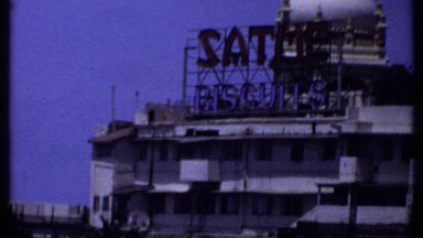 1969: a building on the banks of the river in the middle of the city INDIA