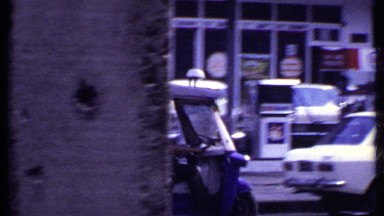 1969: Footage of Vehicles on a Busy Street in India
