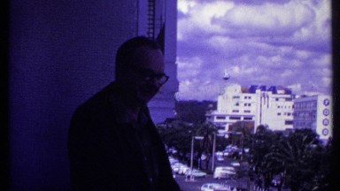 1969: a man looking out into the town KENYA