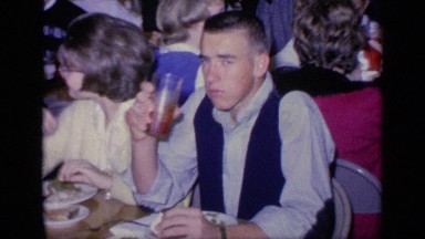 1968: young adults share a meal in a cafeteria. FLORIDA