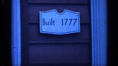 1968: a wooden placard on a building states the year it was built as 1777