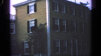 1968: a apartment with three floor located alone at the city and all the windows