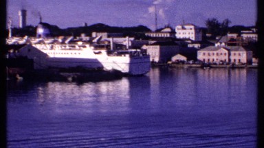 1969: buildings overlooking water with boats sailing on it BAHAMAS