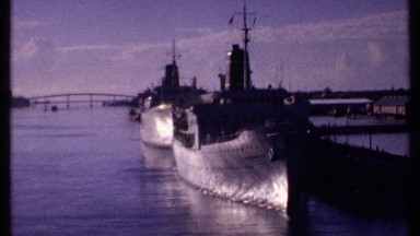 1969: large cruise ships and cargo ships in port. BAHAMAS