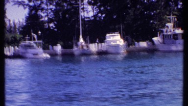 1969: pure water with more boats and that are landing not moving at the water