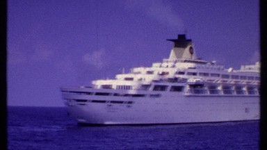 1969: a huge and magnificent passenger ship with white color remains anchored