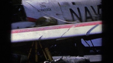 1963: a view of a naval aircraft, people standing near to it GREECE