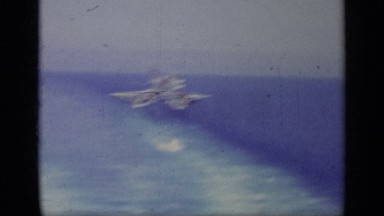 1963: military jet comes in for a smooth landing, stopping for two awaiting