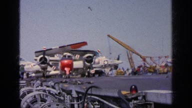 1963: traffic controllers shuttle planes on a navy ship. GREECE