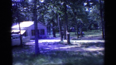 1968: contains man-made buildings,car parking looks like a vacation place