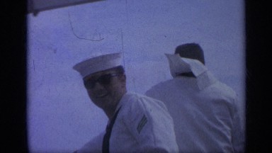 1962: person taking off his cooling glass and smiling ITALY
