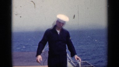 1962: a soldier on board a boat on a windy day ITALY