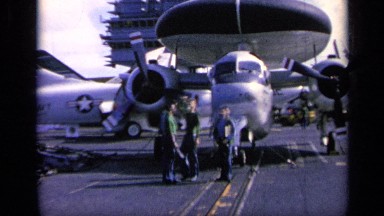 1962: people working in the airport and standing near planes with happy ITALY