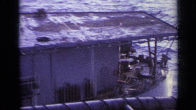 1962: a huge ship trying to save a fishing trawler by securing it with cables