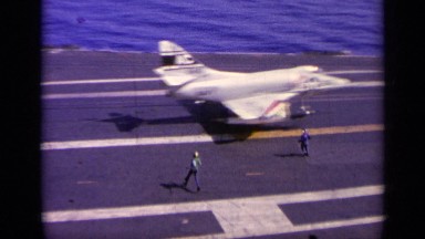 1963: An Aircraft Landing on the Runway of an Aircraft Carrier in the Sea