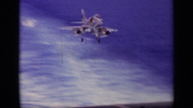 1963: The Aeroplane is Landing on the Road Near the Ocean GREECE