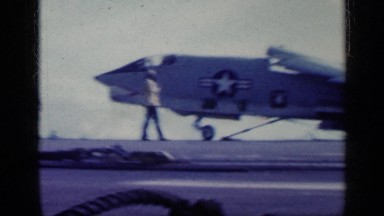 1962: United States Air Force plane taking off with ground crew nearby in Cuba