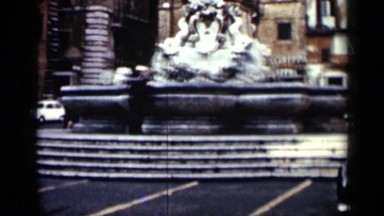 1962: an elegant statue in front of an old style building beside the street CUBA