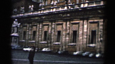1962: An Old Building with Pillars and a Statue in Cuba