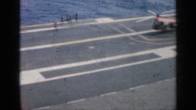 1962: The Crew of an Aircraft Carrier Are Seen on the Deck